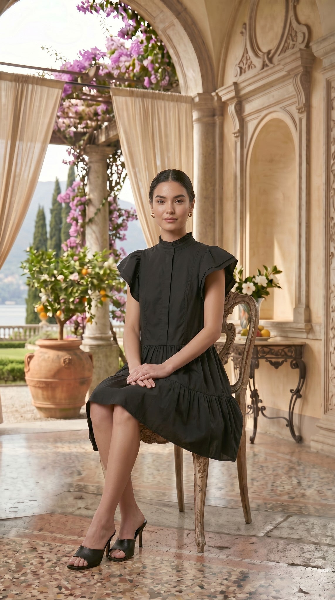 Elegant Flutter-Sleeve Black Midi Dress with Structured Pleat Detailing