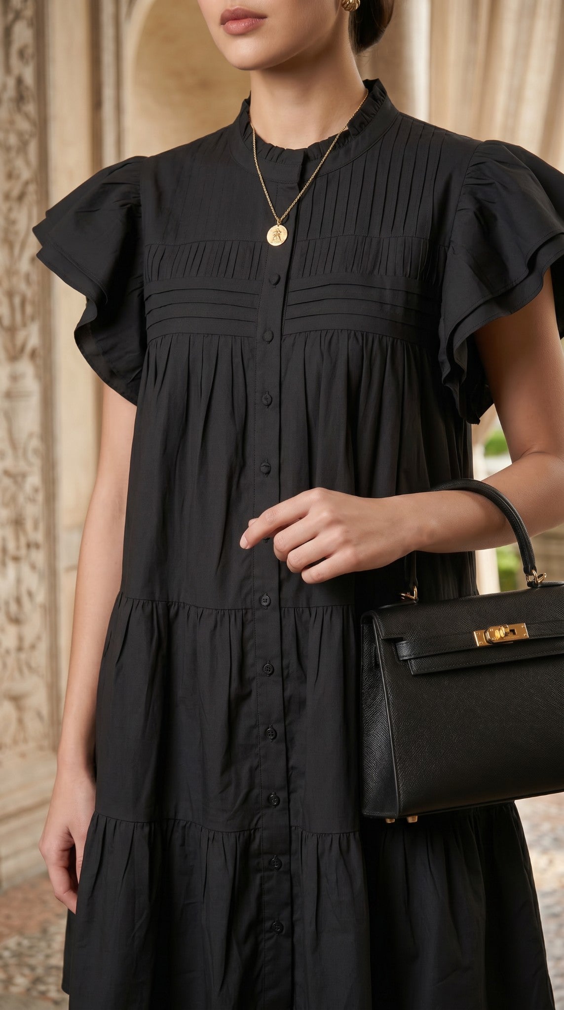 Elegant Flutter-Sleeve Black Midi Dress with Structured Pleat Detailing